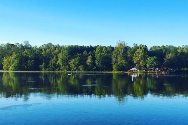 Salem Lake and its wooded shoreline in Winston-Salem